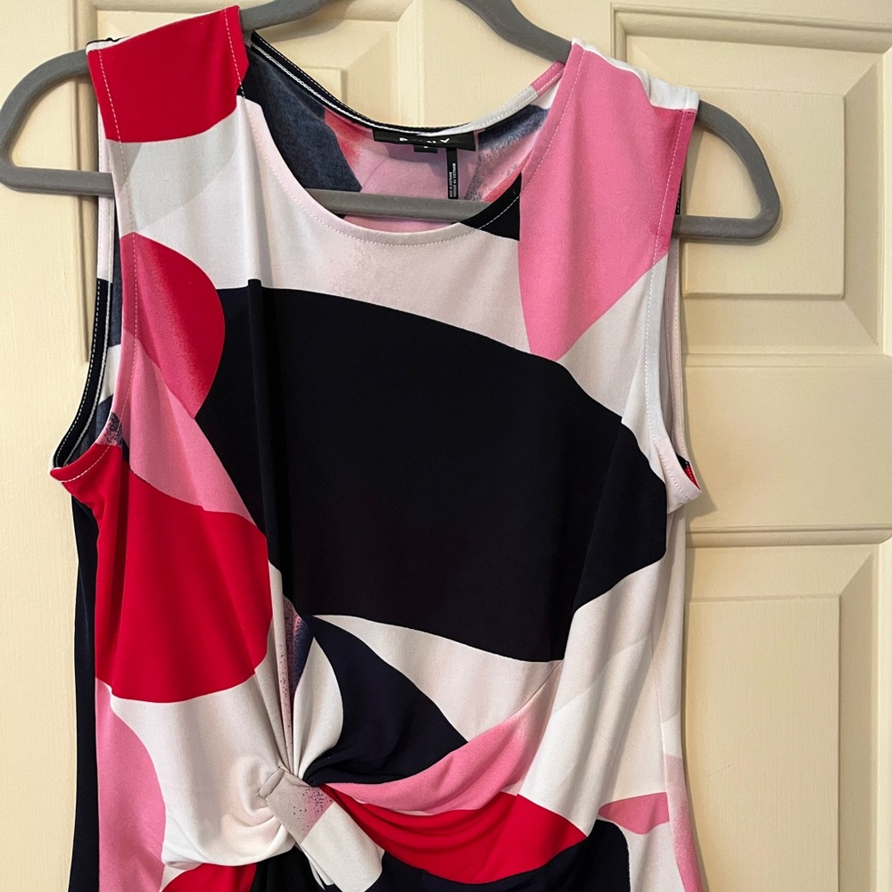DKNY sleeveless top with flattering draping in front